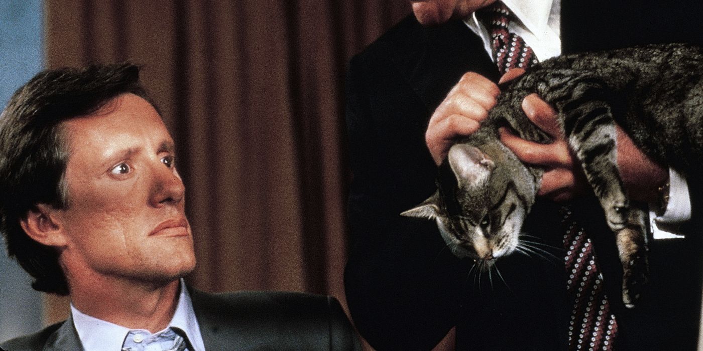 James Woods with a cat in Cat's Eye