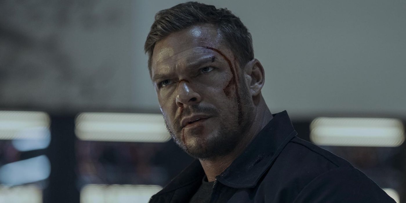 Reacher is bloody in a scene from Reacher