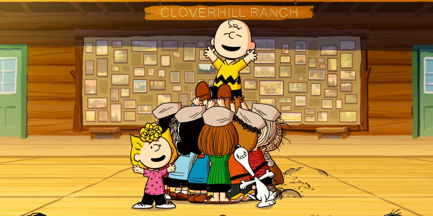 The peanut gang happily holding up Charlie Brown in Snoopy Presents: A Summer Special