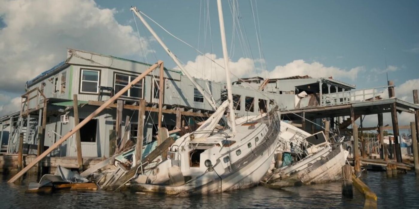 Sail boats destroyed by a pier during Hurricane Ian in Survival Mode