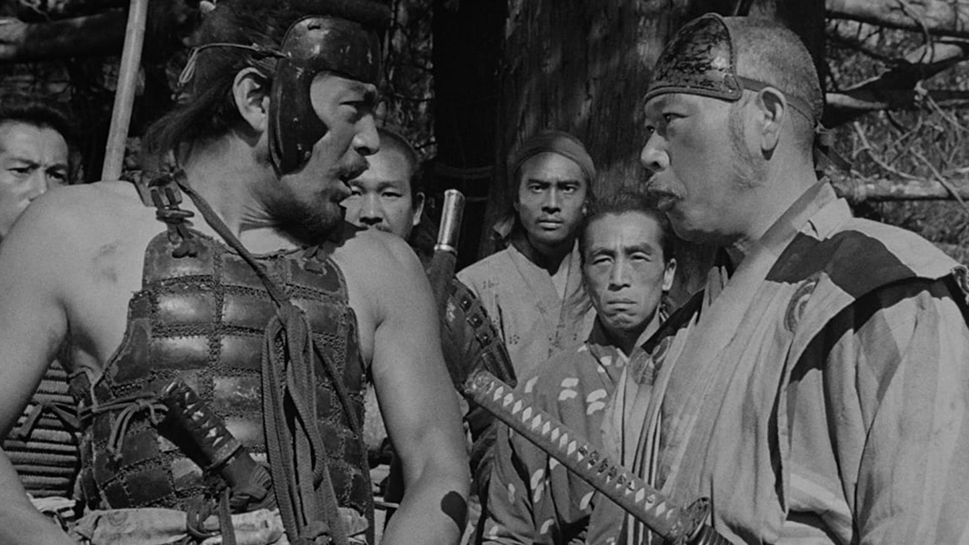 Actors Toshiro Mifune and Takashi Shimura as Kikuchiyo and Kambei Shimada in the epic film Seven Samurai