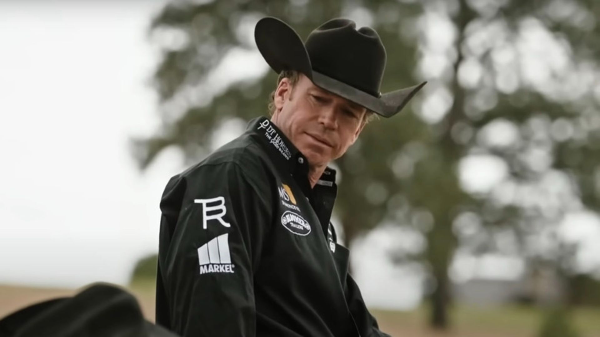 Travis rides a horse in Yellowstone