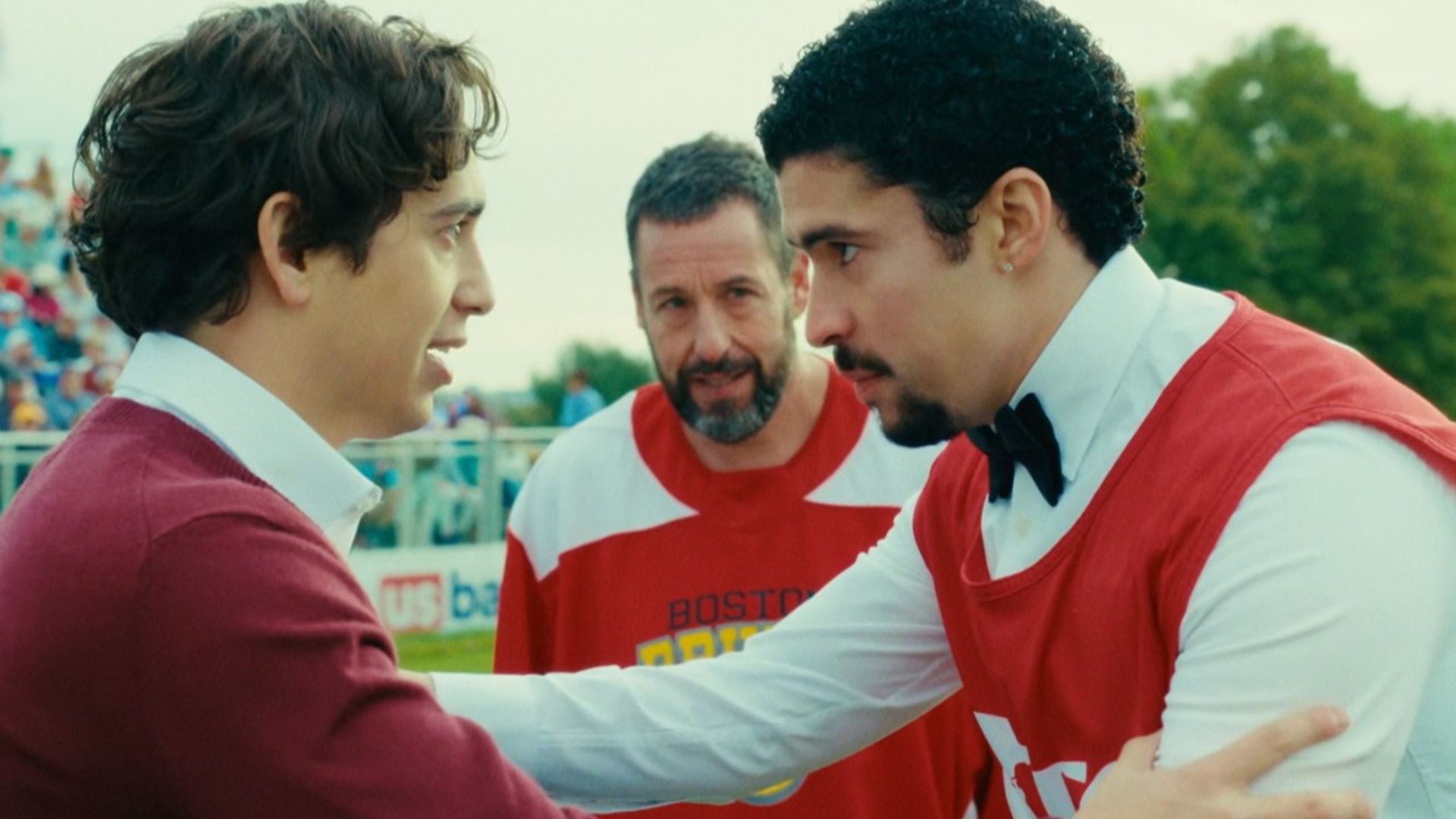 Bad Bunny helping a younger golfer on the field in Happy Gilmore 2