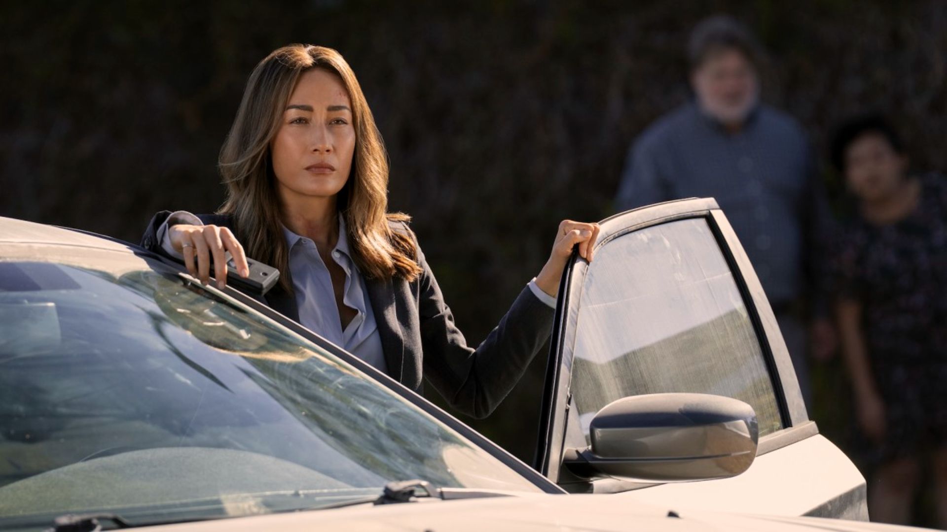 Ballard exits her car in Ballard