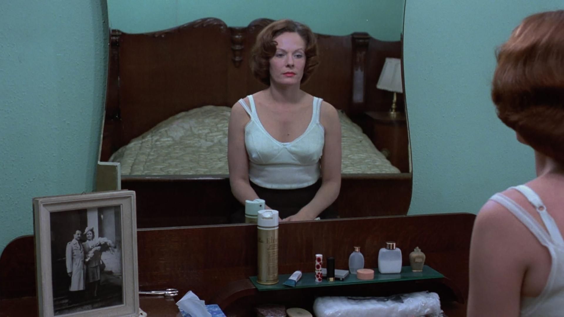 Actress Delphine Seyrig as Jeane Dielmann in the drama film Jeanne Dielman, 23 quai du Commerce, 1080 Bruxelles