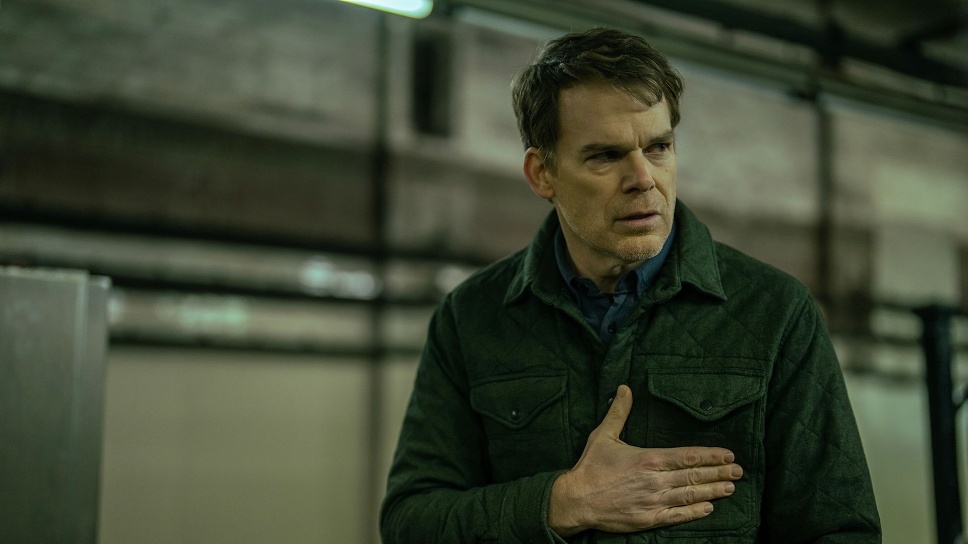 Dexter in a subway station holding his heart in Dexter: Resurrection