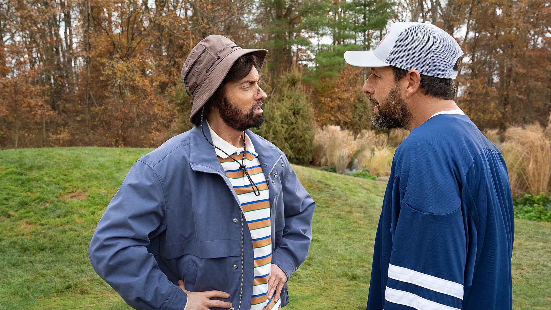 Eminem as Donald Jr. with his hands on his hips talking to Happy in Happy Gilmore 2.