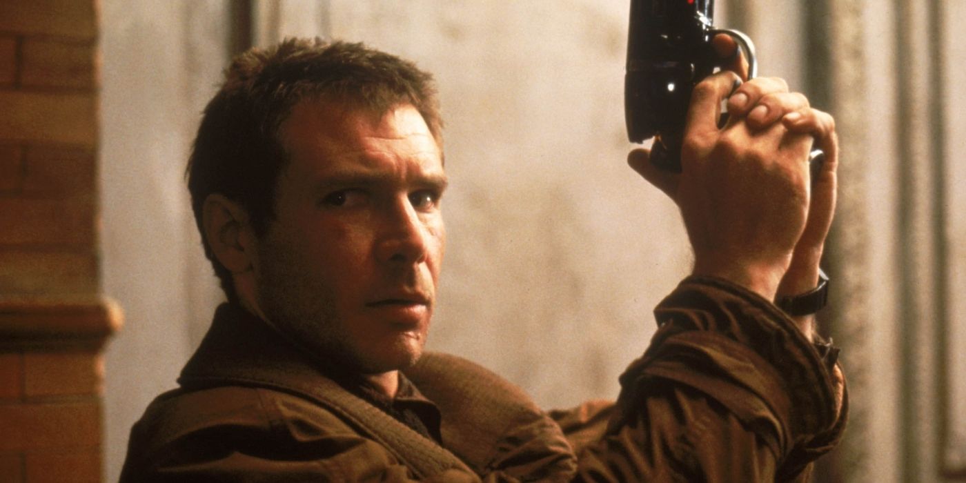 Harrison Ford stars in Blade Runner holding a pistol standing against a wall
