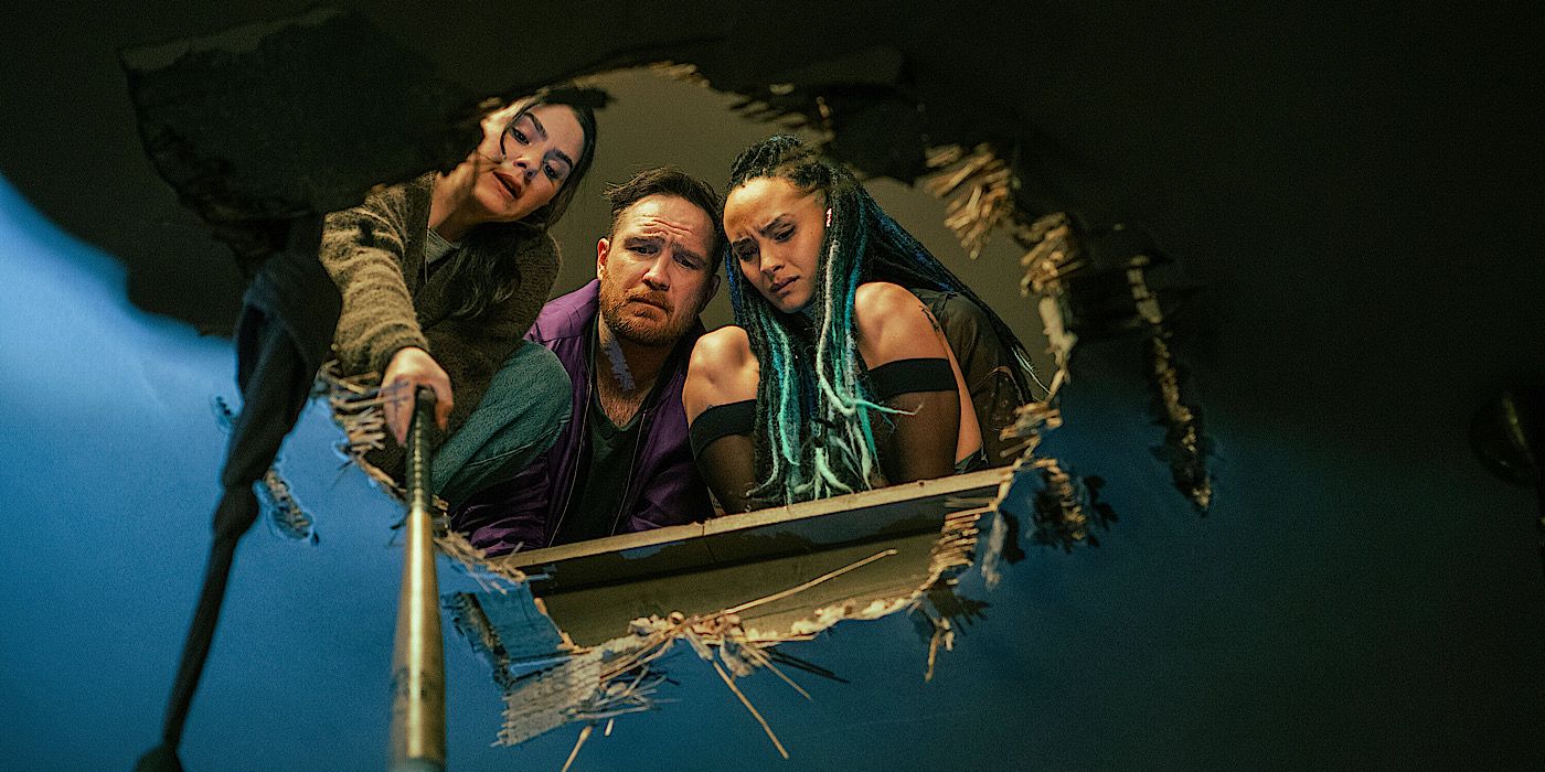 Characters Looking Down a Hole in Brick on Netflix