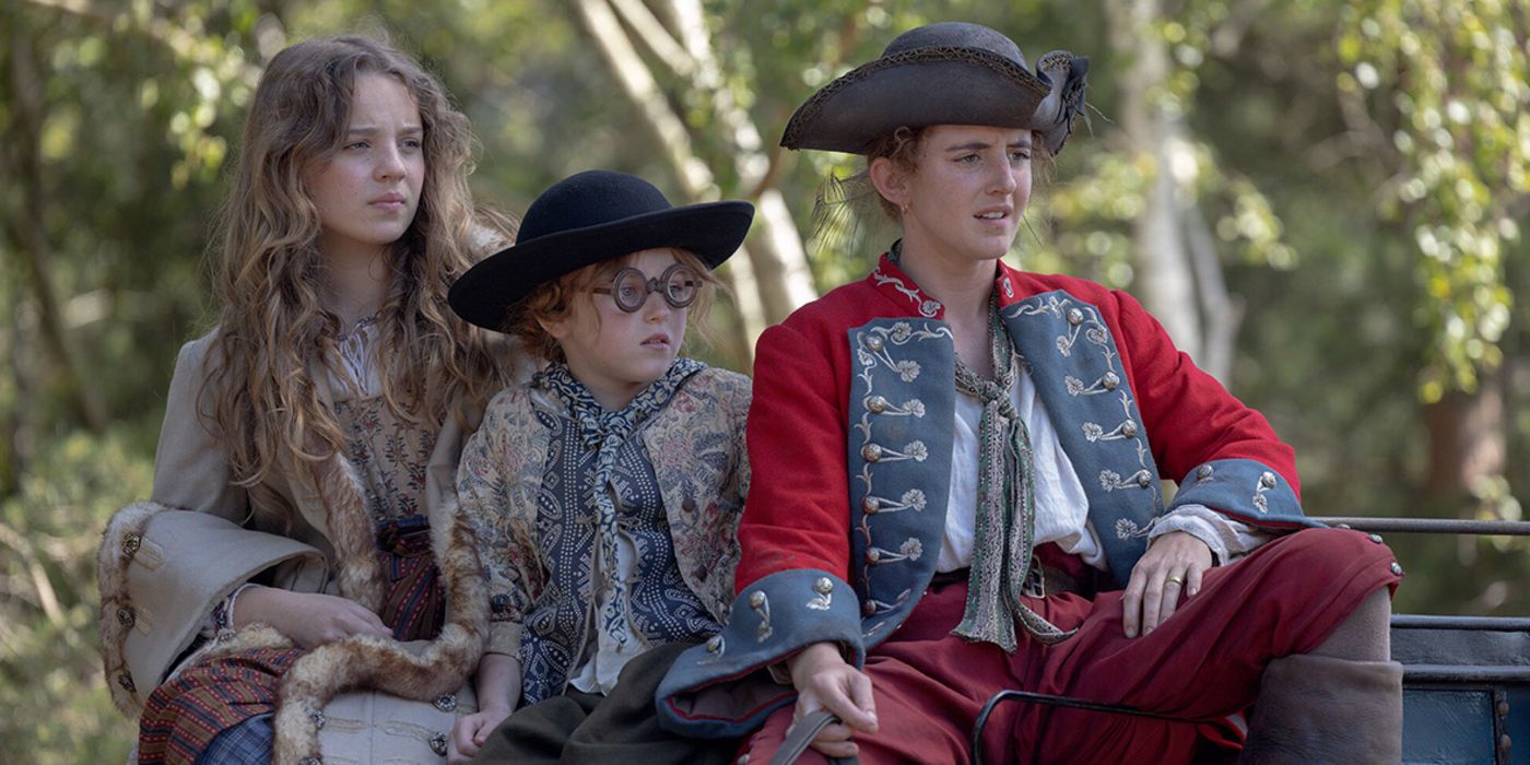 Roxy, George, and Nell sit in a carriage in Renegade Nell