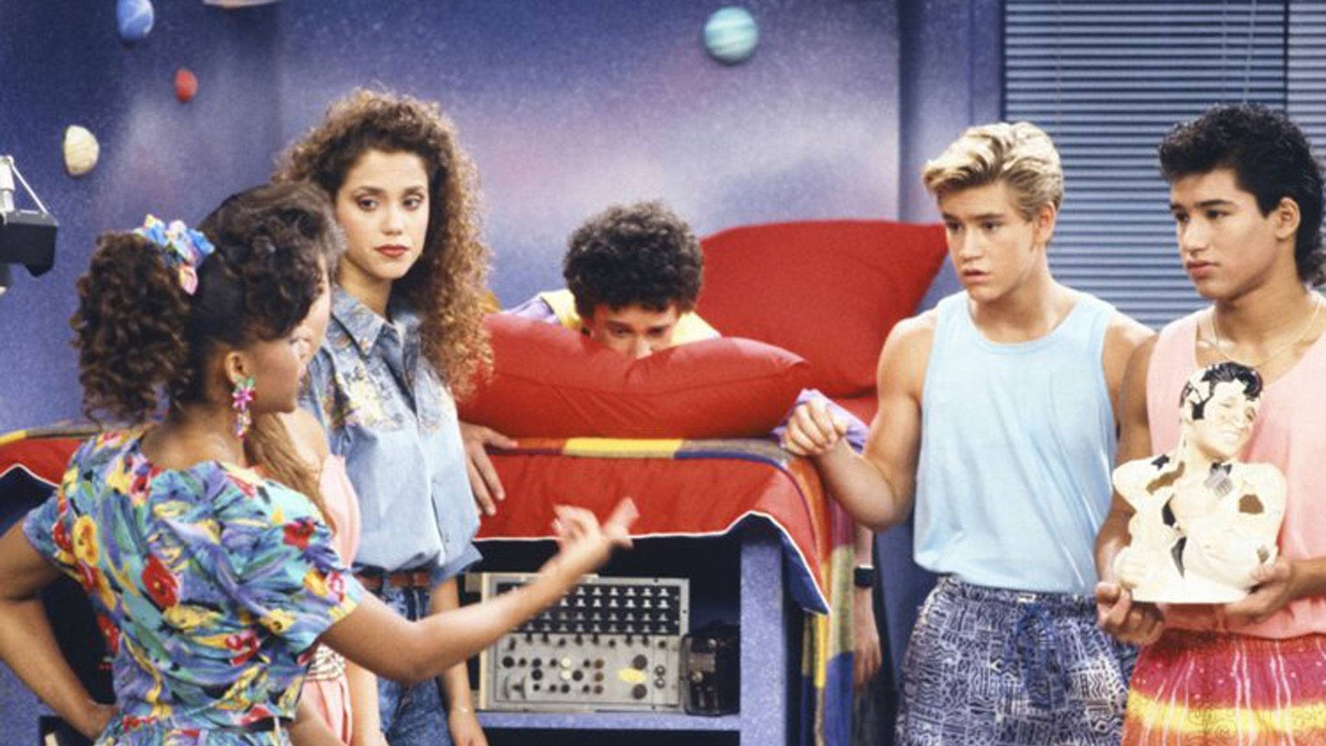 The kids in Screech's room holding an Elvis statue in Saved by the Bell.