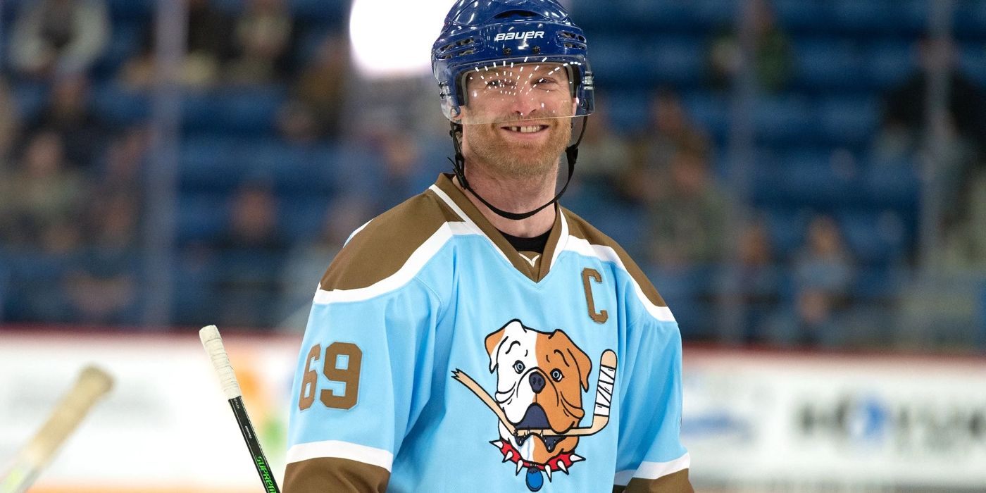 Shoresy smiles in a hockey rink in Shoresy