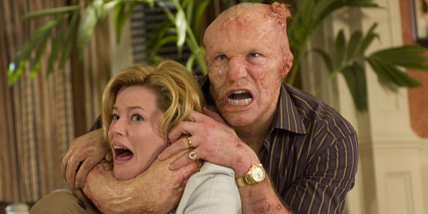 A deformed Michael Rooker attacks Elizabeth Banks in Slither 2006