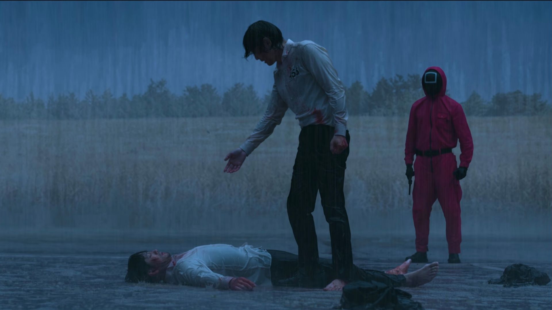 Gi-hun and Sang-woo battle in the final game of Squid Game season 1.