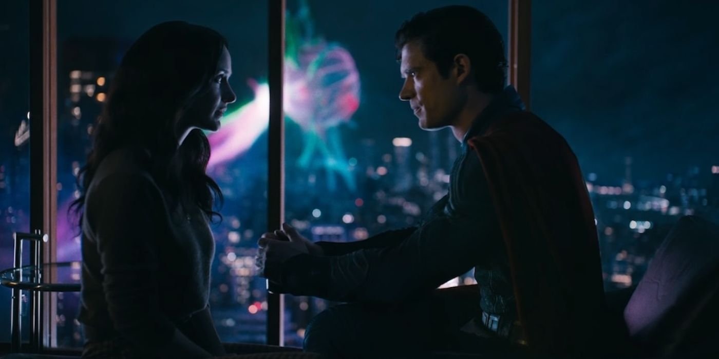 David Corenswet and Rachel Brosnahan in Superman talking with a monster in the background