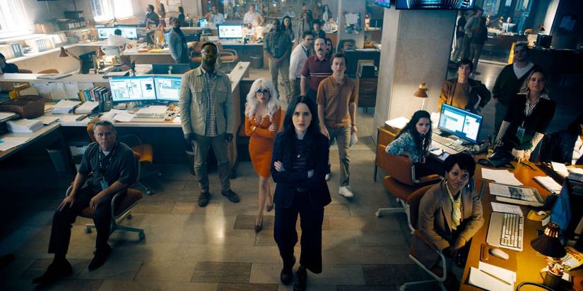 Rachel Brosnahan's Lois Lane and other office workers looking up in Superman