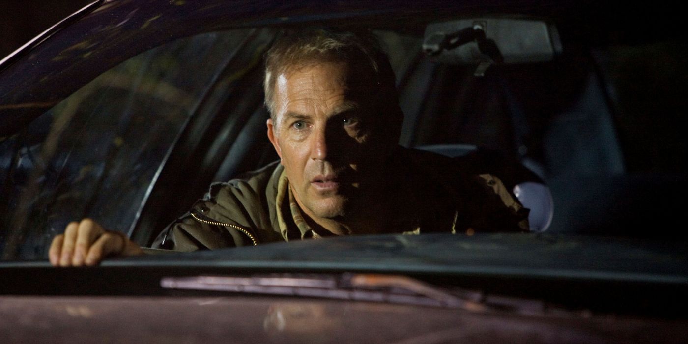 Kevin Costner sitting behind the wheel of a car in The New Daughter