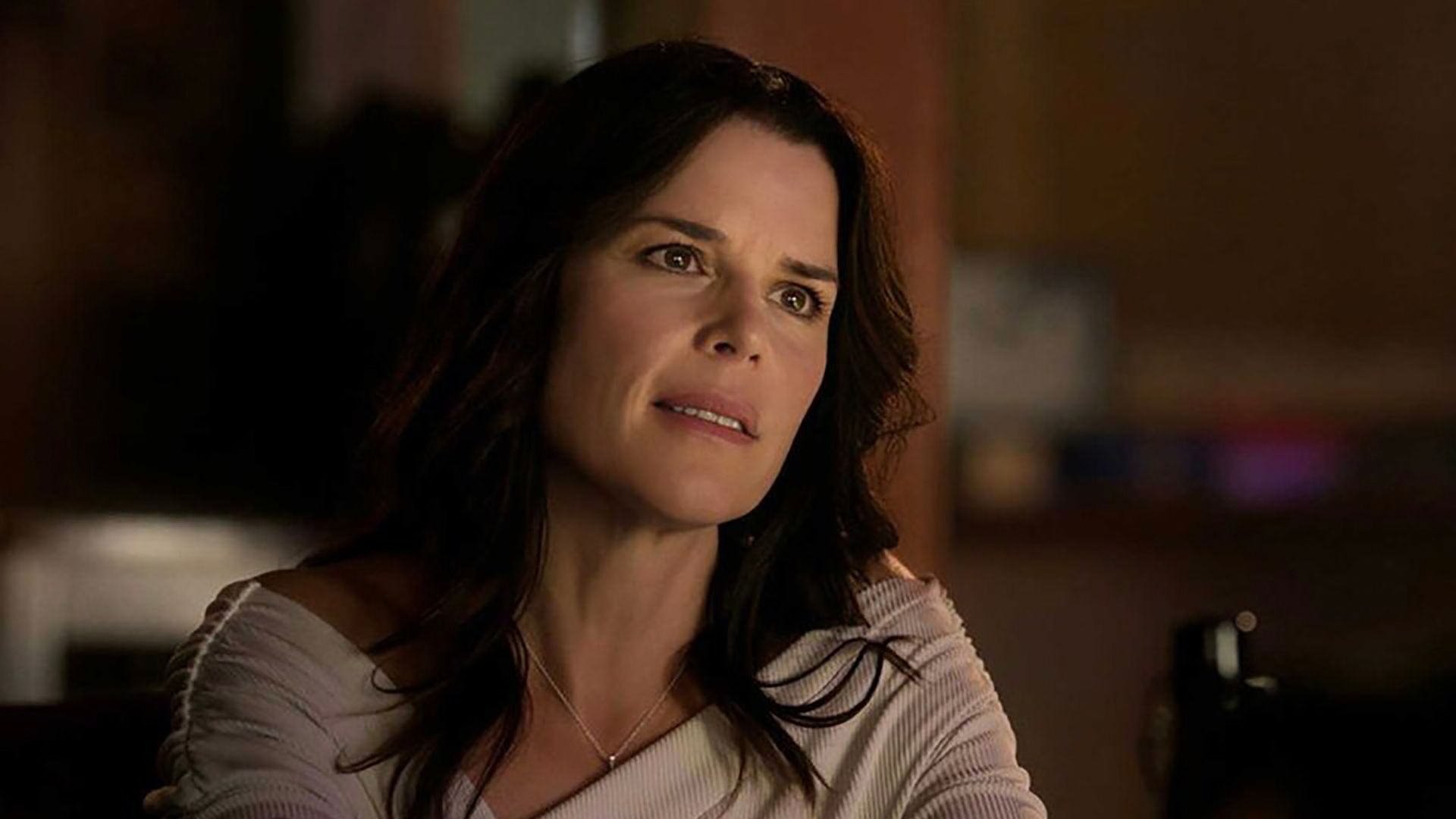 Neve Campbell as Raven from Twisted Metal season 1 talking and looking mean.