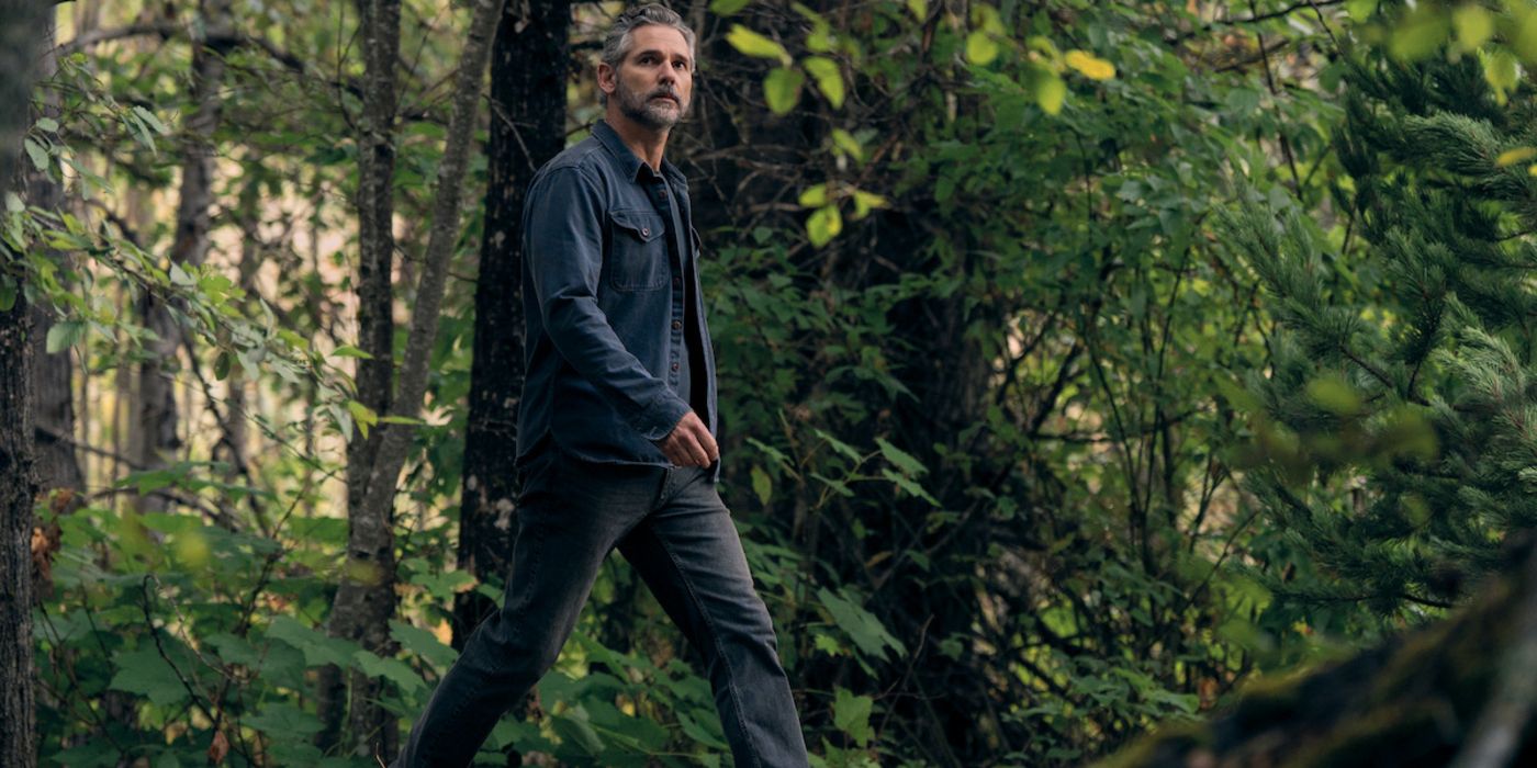 Kyle walks in the woods in Untamed