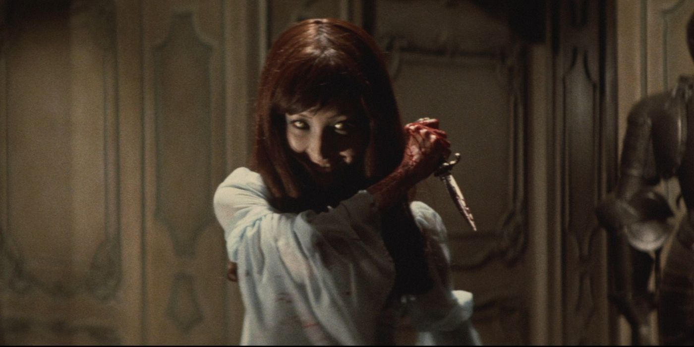 A woman wields a knife in 'The Vampire Doll' (1971)