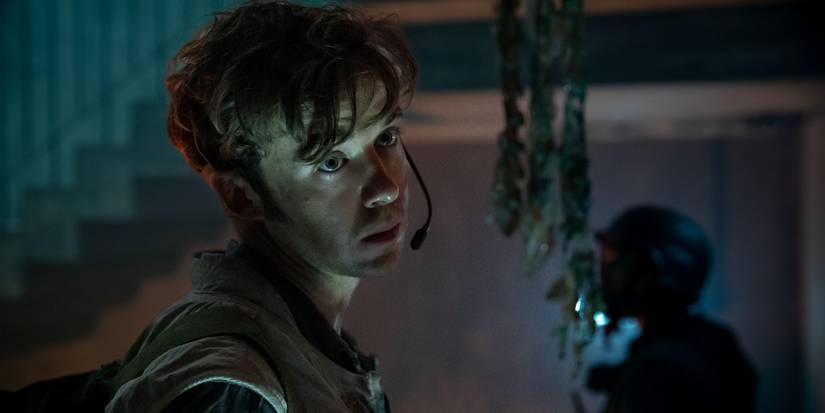 Hermit wears a headset in Alien: Earth