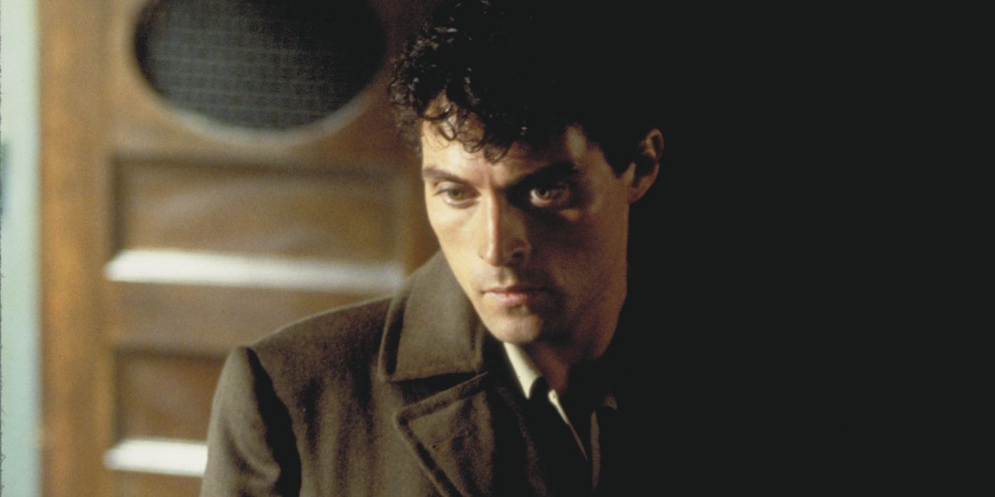 John wears a trench coat in Dark City