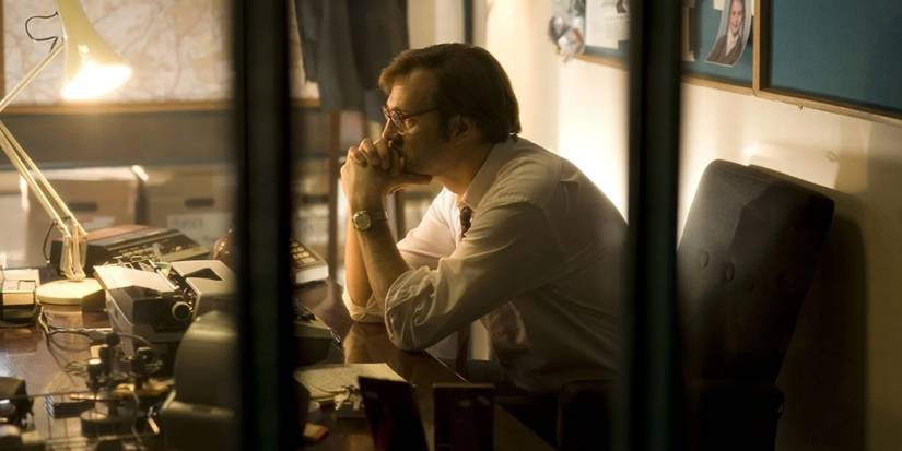 david morrissey sits in a desk in red riding 1983