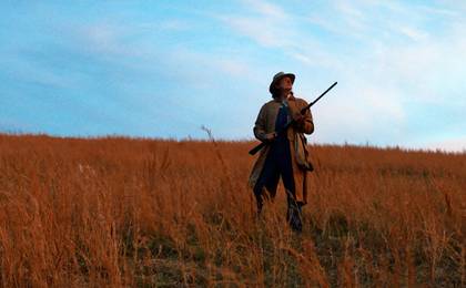 Trace Adkins in a Field With a Gun in 2021 Western Old Henry