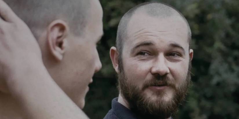 jamie and john in snowtown talking outside