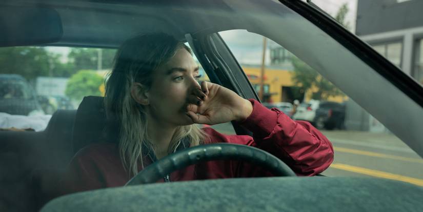 Vanessa Kirby as Lynette sitting in a car in Night Always Comes