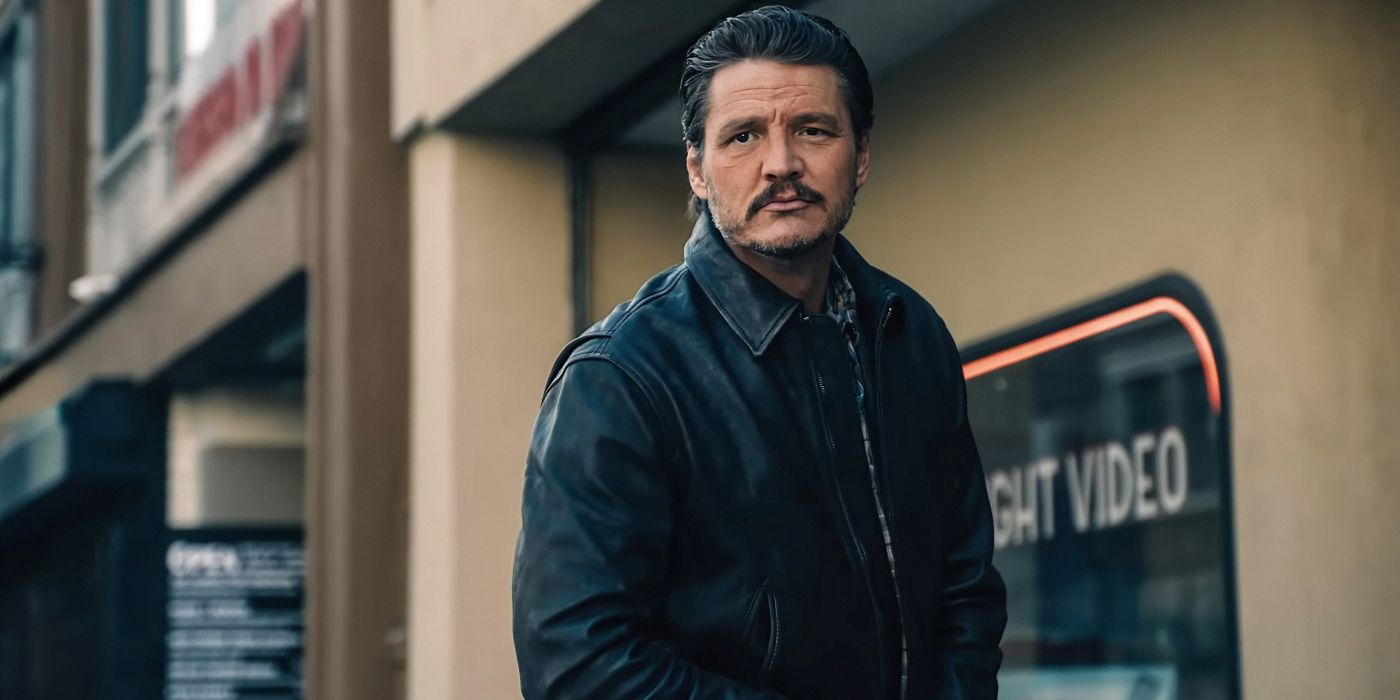 Pedro Pascal in Freaky Tales wearing a black leather jacket outside a video store