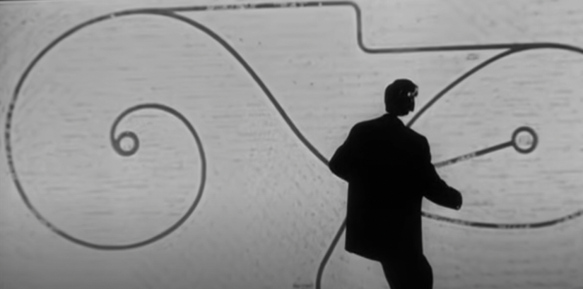 Richard Boone as Robert Kraft stands in front of a cemetery map in 'I Bury the Living'