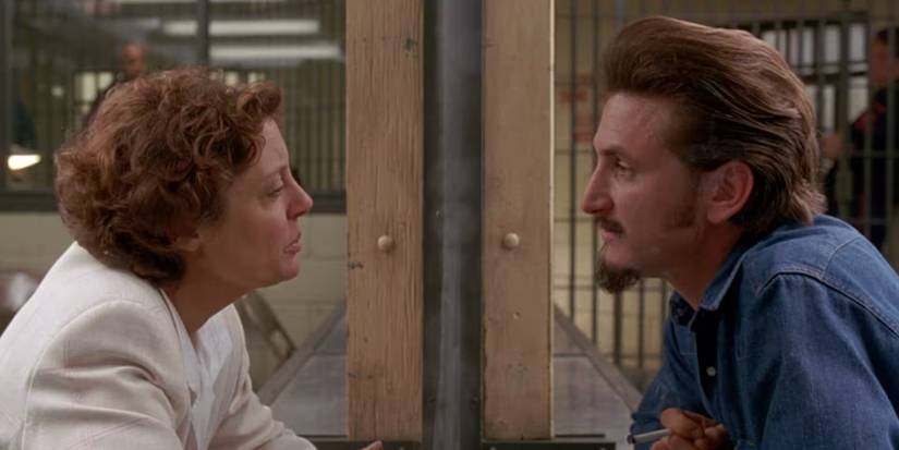 susan Sarandon and sean Penn talk to each other in a prison in Dead Man Walking