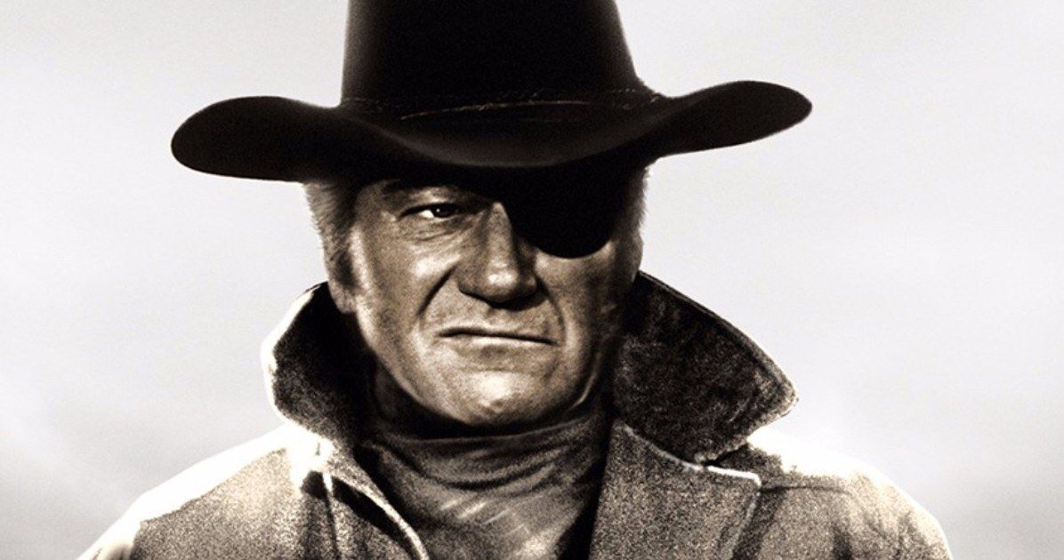 John Wayne with an eyepatch and coat in True Grit