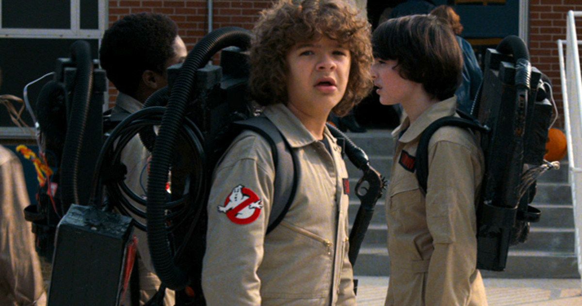 Dustin and his friends in Ghostbusters outfits in Stranger Things