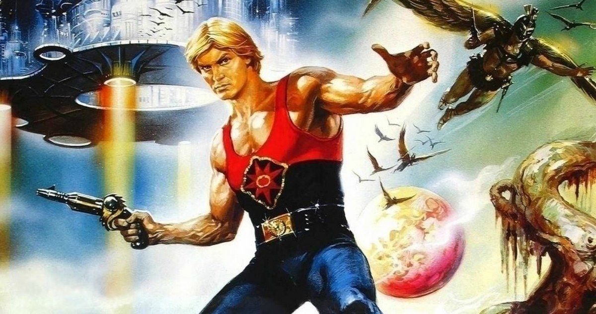 Flash Gordon with a gun surrounded by aliens and spaceships