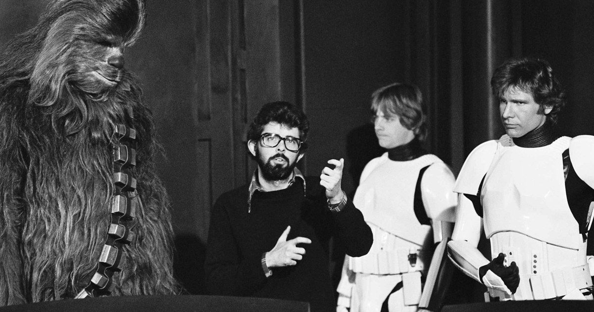 George Lucas on set with Chewbacca Actor Peter Mayhew and Harrison Ford and Mark Hamill in storm trooper suits