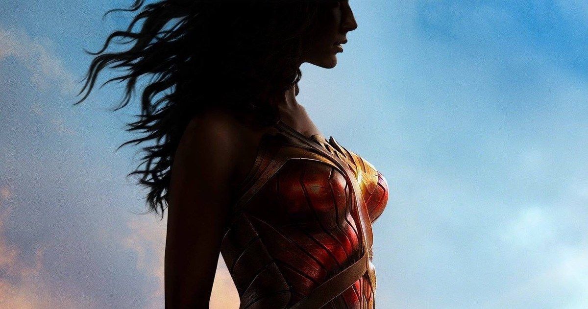 Gal Gadot standing in the shadows in front of the sky in Wonder Woman