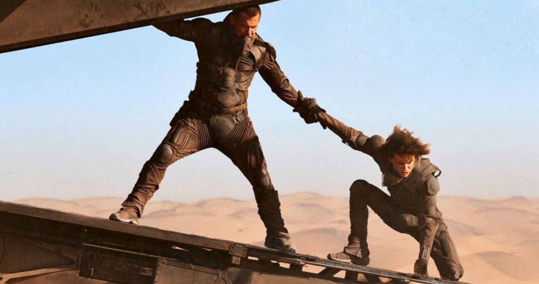 New Dune Image Puts Josh Brolin and Timothee Chalamet on the Edge of Danger