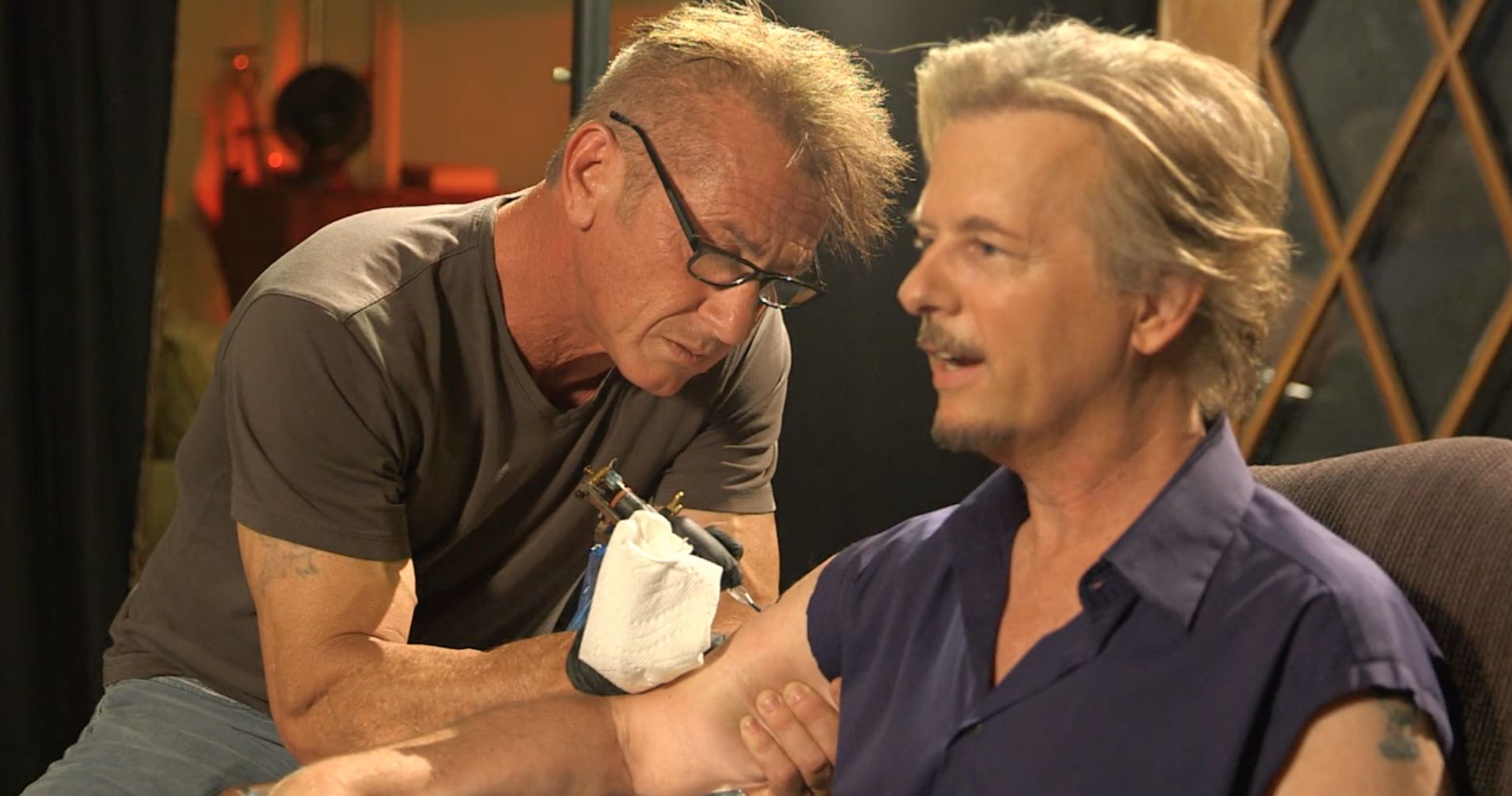 Watch David Spade Get His 2nd Tattoo from Sean Penn in Honor of Chris Farley