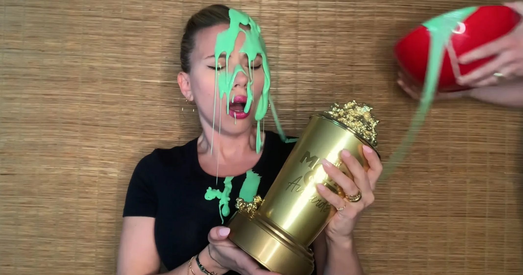 Watch Scarlett Johansson Get Slimed in MTV Movie and TV Awards Prank Pulled by Colin Jost