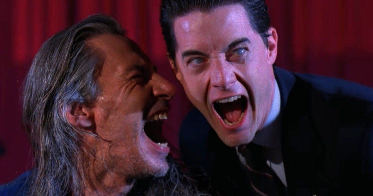 Bob screams into a laughing evil Dale Cooper's ear in Twin Peaks
