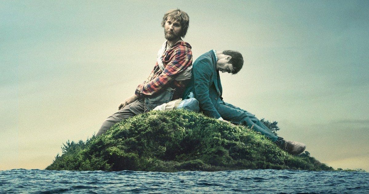 Paul Dano sits on an island next to Daniel Radcliffe as a Farting Corpse in Swiss Army Man