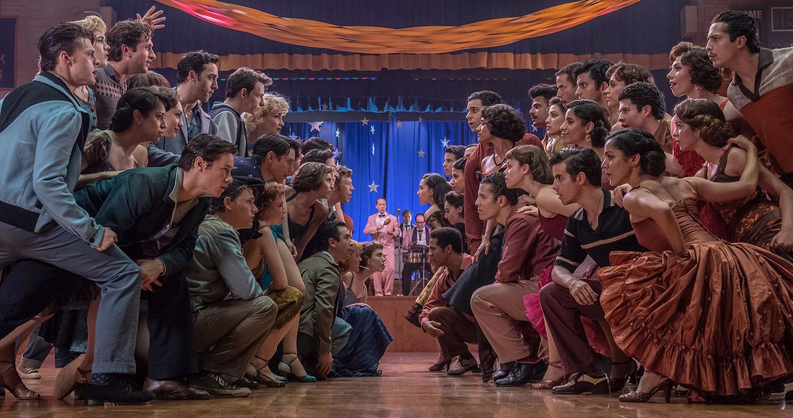 West Side Story cast, the men on one side of the dance hall and the women on the other