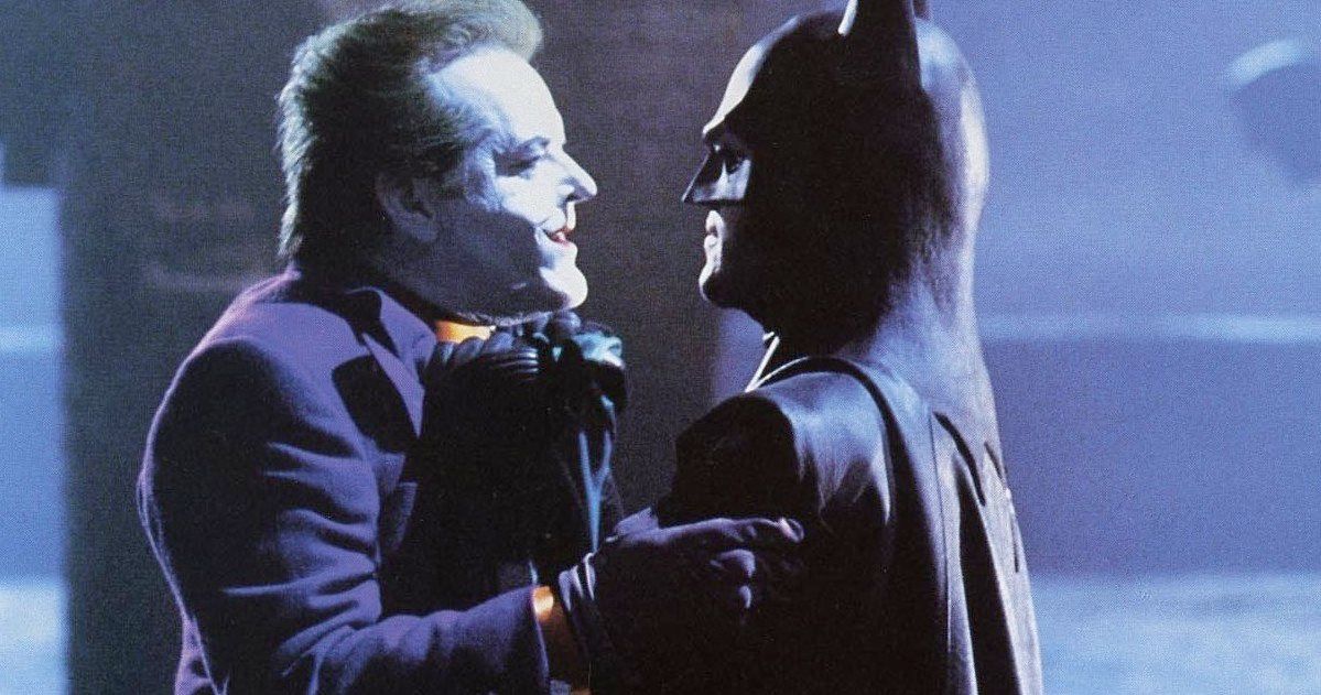 Batman holds Jack Nicholson's Joker 
