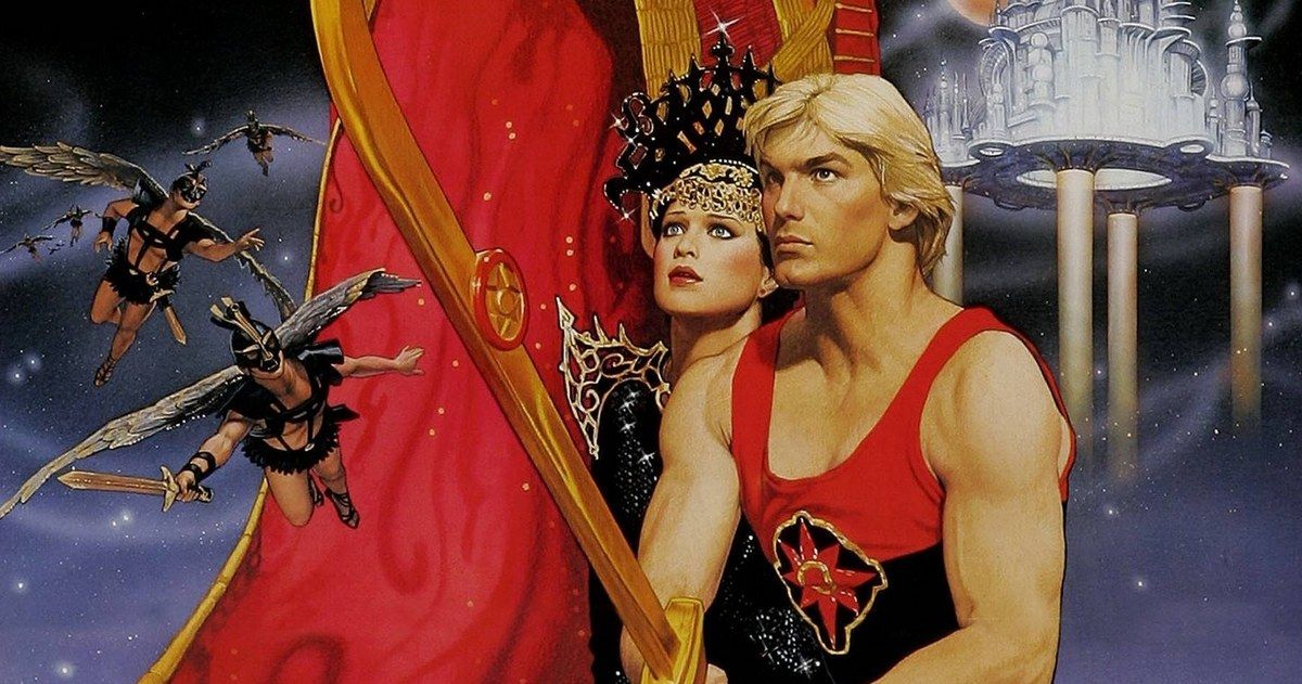 Flash Gordon has a big sword to protect a woman in the 1980 film