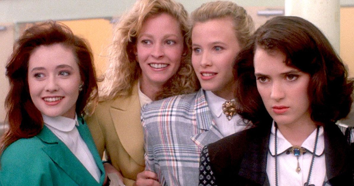 Winona Ryder is dark and grim while the Heathers laugh