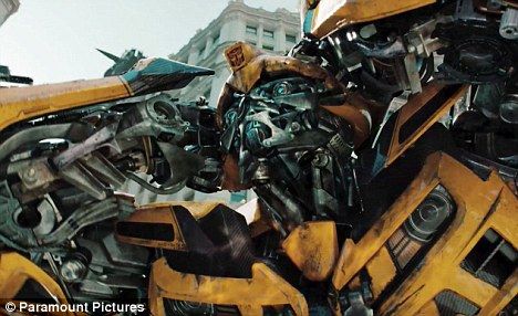 Bumblebee in Transformers: Dark of the MoonAfter that full opening sequence, we cut into a montage of interesting shots compiled from {10}. We start out with a few brief glimpses at {11} as Sam Witwicky, and the lovely newcomer {12} as Sam's new squeeze, Carly. They also showed us an interesting sequence involving soldiers using these glider suits, these full body suits that almost resemble webbed feet, which allows skydivers to actually glide/fly through the air before they deploy their chutes.