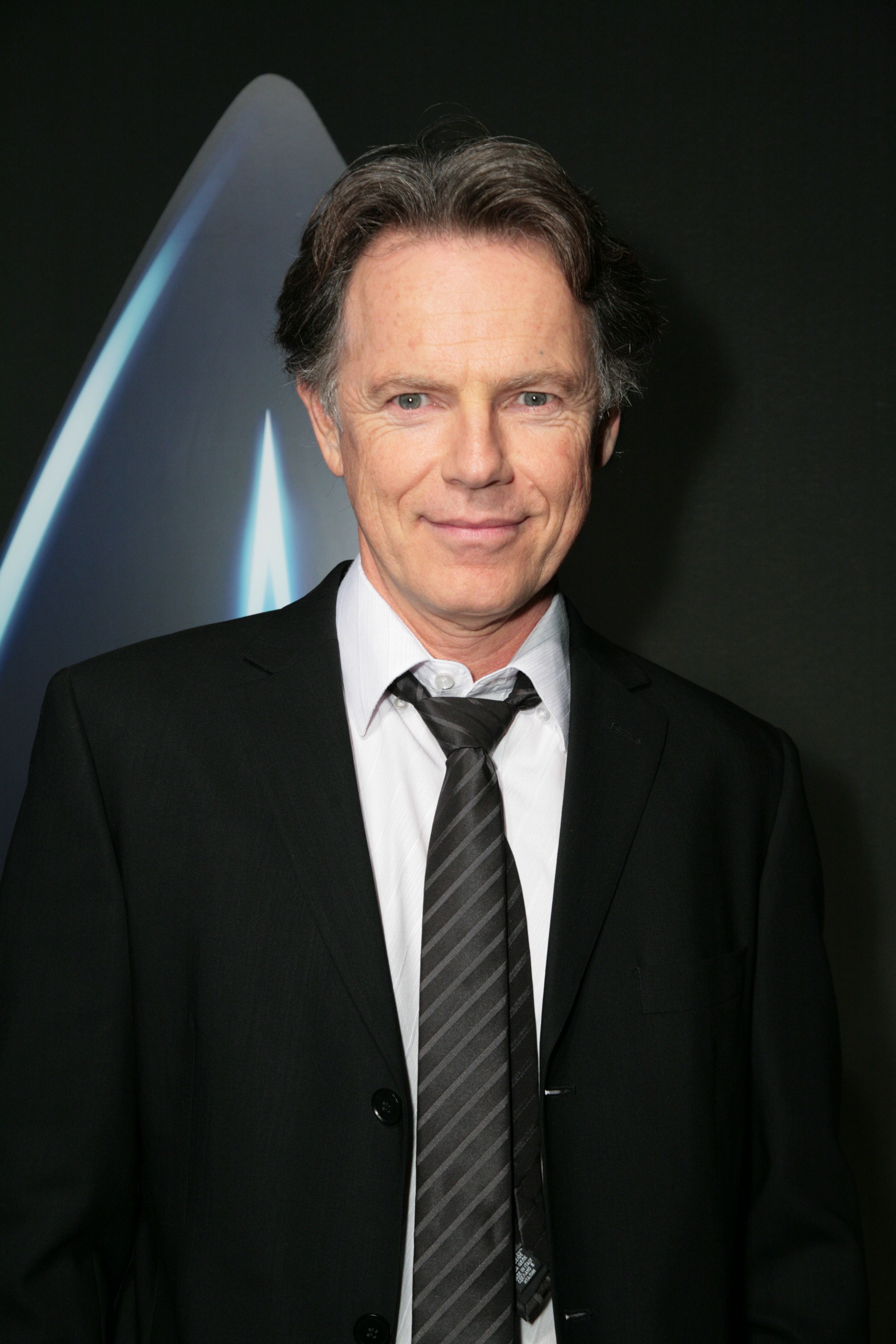 Bruce Greenwood Isn't Sure If He'll Appear in Star Trek 2We were recently at the DVD launch party for the summer blockbuster {0}, which is currently available on DVD and {1} shelves now. Among the many actors we spoke with at the event was Bruce Greenwood, who played Captain Pike in the film. He revealed that he'd like to appear in {2}, but isn't sure it will happen.