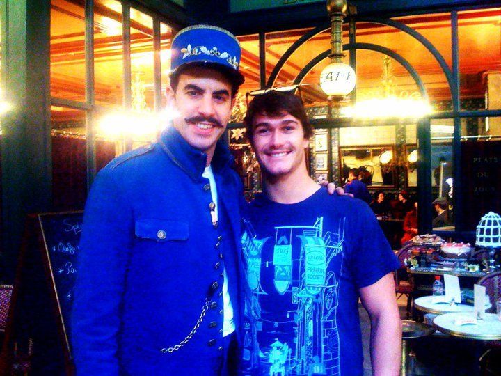 Sacha Baron Cohen and a fan on the Hugo Cabret set
